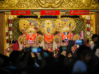 Many devotees are offering prayers at the Jagannath Temple on the eve of Lord Jagannath's 147th Rath Yatra in Ahmedabad, India, on Saturday....