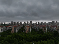 The city of Lianyungang is being covered by dark clouds in Lianyungang, China, on July 7, 2024. (