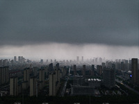 The city of Lianyungang is being covered by dark clouds in Lianyungang, China, on July 7, 2024. (