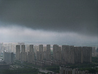 The city of Lianyungang is being covered by dark clouds in Lianyungang, China, on July 7, 2024. (