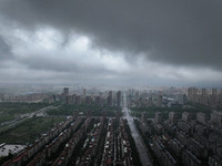 The city of Lianyungang is being covered by dark clouds in Lianyungang, China, on July 7, 2024. (