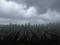 The city of Lianyungang is being covered by dark clouds in Lianyungang, China, on July 7, 2024. (