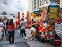 Sabrett Hot Dogs push-cart and steam vents in Manhattan, New York, United States of America, on July 6th, 2024.
 (