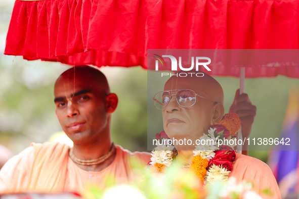 Members of ISKON are taking part in the Jagannath Chariot procession in Kathmandu, Nepal, on July 7, 2024. 