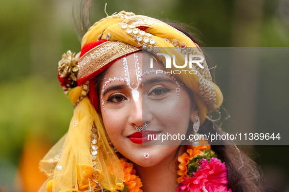 Nepali devotees are decorating as Lord Krishna and participating in the chariot of Lord Jagannath procession in Kathmandu, Nepal, on July 7,...