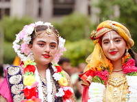 Nepali devotees are decorating as Lord Krishna and Radha and participating in the chariot of Lord Jagannath procession in Kathmandu, Nepal,...