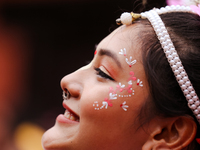 A Nepali devout is performing a dance ahead of the Lord Jagannath chariot that is rolling out on the street of Kathmandu, Nepal, on July 7,...