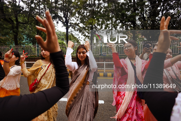 A Nepali devout is performing a dance ahead of the Lord Jagannath chariot that is rolling out on the street of Kathmandu, Nepal, on July 7,...