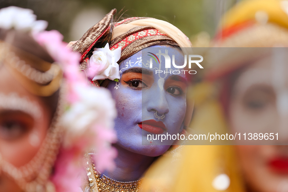 Nepali devotees are decorating as Lord Krishna and participating in the chariot of Lord Jagannath procession in Kathmandu, Nepal, on July 7,...