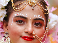 Nepali devotees are decorating as Radha and participating in the chariot of Lord Jagannath procession in Kathmandu, Nepal, on July 7, 2024....