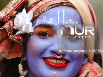 Nepali devotees are decorating as Lord Krishna and participating in the chariot of Lord Jagannath procession in Kathmandu, Nepal, on July 7,...