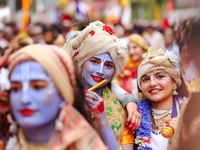 Nepali devotees are decorating as Lord Krishna and Radha and participating in the chariot of Lord Jagannath procession in Kathmandu, Nepal,...