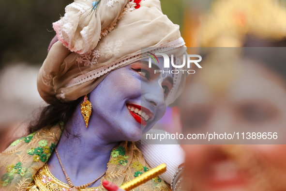 Nepali devotees are decorating as Lord Krishna and participating in the chariot of Lord Jagannath procession in Kathmandu, Nepal, on July 7,...