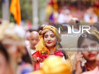 Nepali devotees are decorating as Lord Krishna and participating in the chariot of Lord Jagannath procession in Kathmandu, Nepal, on July 7,...