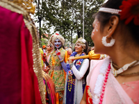 Nepali devotees are decorating as Lord Krishna and Radha and participating in the chariot of Lord Jagannath procession in Kathmandu, Nepal,...