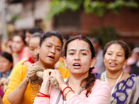 Devotees are pulling the chariot of Lord Jagannath during the Jagannath Rath Yatra procession in Kathmandu, Nepal, on July 7, 2024. (