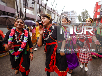 A Nepali devout is performing a dance ahead of the Lord Jagannath chariot that is rolling out on the street of Kathmandu, Nepal, on July 7,...