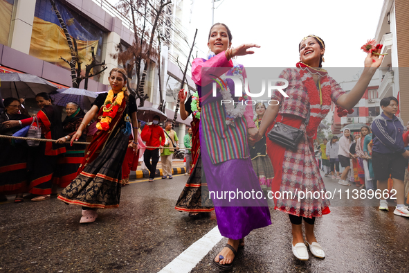 A Nepali devout is performing a dance ahead of the Lord Jagannath chariot that is rolling out on the street of Kathmandu, Nepal, on July 7,...