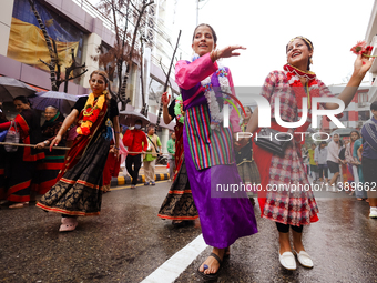 A Nepali devout is performing a dance ahead of the Lord Jagannath chariot that is rolling out on the street of Kathmandu, Nepal, on July 7,...