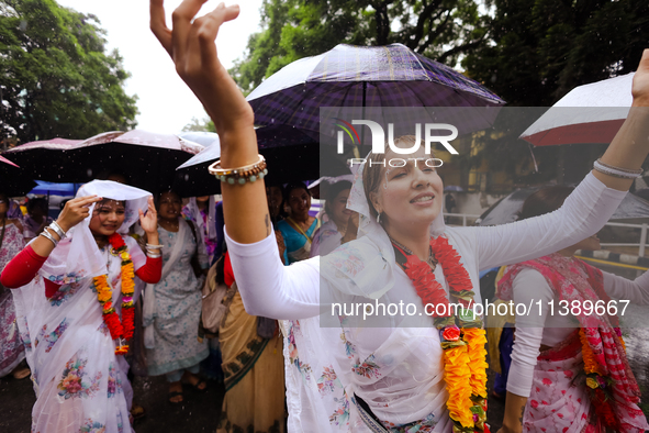 A Nepali devout is performing a dance ahead of the Lord Jagannath chariot that is rolling out on the street of Kathmandu, Nepal, on July 7,...