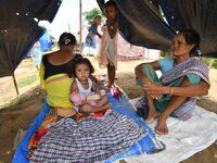 Flood-affected villagers are staying at a relief camp during the flood near Patiapum village in Nagaon District of Assam, India, on July 7,...