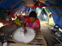 Flood-affected villagers are staying at a relief camp during the flood near Patiapum village in Nagaon District of Assam, India, on July 7,...