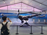 An eVTOL, a low-altitude electric vertical take-off and landing vehicle produced by AUTOFLIGHT, is being displayed at the 2024 WAIC in Shang...