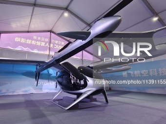 An eVTOL, a low-altitude electric vertical take-off and landing vehicle produced by AUTOFLIGHT, is being displayed at the 2024 WAIC in Shang...