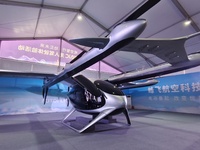 An eVTOL, a low-altitude electric vertical take-off and landing vehicle produced by AUTOFLIGHT, is being displayed at the 2024 WAIC in Shang...