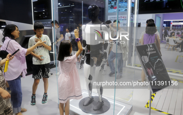 The Optimus-Gen 2 humanoid robot is being seen at the Tesla Exhibition area at the 2024 WAIC in Shanghai, China, on July 7, 2024. 