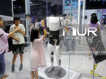 The Optimus-Gen 2 humanoid robot is being seen at the Tesla Exhibition area at the 2024 WAIC in Shanghai, China, on July 7, 2024. (