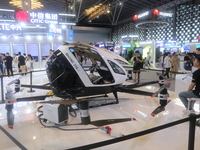 An eVTOL, a low-altitude electric vertical take-off and landing vehicle produced by CITIC Group, is on display at the 2024 WAIC in Shanghai,...