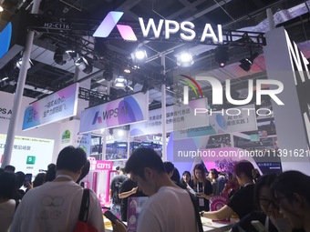 Visitors are visiting the WPS AI 2.0 version launched by Kingsoft Office at the 2024 World Artificial Intelligence Conference in Shanghai, C...