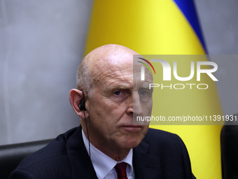 John Healey, Secretary of State for the Defence of the UK, is being seen during a joint briefing with Minister of Defence of Ukraine Rustem...