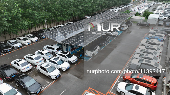 Charging stations are filling with charging vehicles in Shenyang, China, on July 8, 2024. It is understood that the charging station is sett...