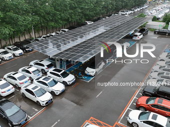 Charging stations are filling with charging vehicles in Shenyang, China, on July 8, 2024. It is understood that the charging station is sett...