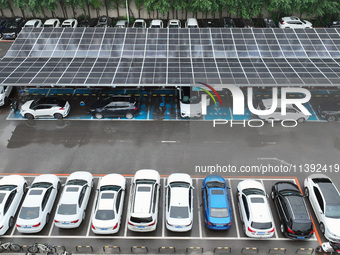 Charging stations are filling with charging vehicles in Shenyang, China, on July 8, 2024. It is understood that the charging station is sett...