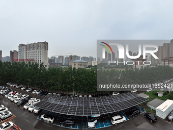 Charging stations are filling with charging vehicles in Shenyang, China, on July 8, 2024. It is understood that the charging station is sett...