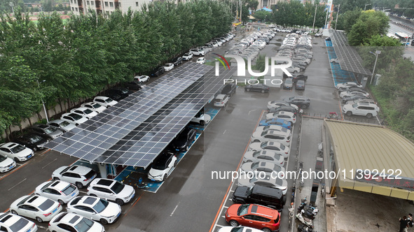 Charging stations are filling with charging vehicles in Shenyang, China, on July 8, 2024. It is understood that the charging station is sett...