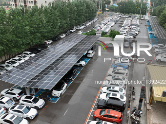 Charging stations are filling with charging vehicles in Shenyang, China, on July 8, 2024. It is understood that the charging station is sett...