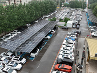 Charging stations are filling with charging vehicles in Shenyang, China, on July 8, 2024. It is understood that the charging station is sett...