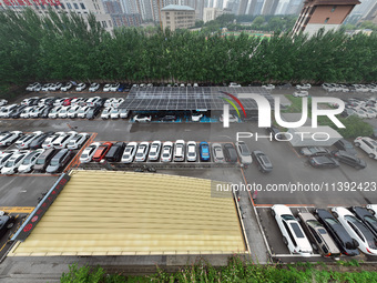 Charging stations are filling with charging vehicles in Shenyang, China, on July 8, 2024. It is understood that the charging station is sett...