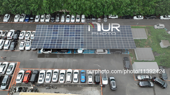 Charging stations are filling with charging vehicles in Shenyang, China, on July 8, 2024. It is understood that the charging station is sett...