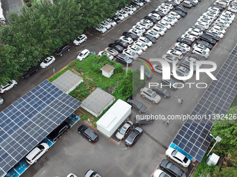 Charging stations are filling with charging vehicles in Shenyang, China, on July 8, 2024. It is understood that the charging station is sett...