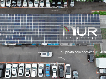 Charging stations are filling with charging vehicles in Shenyang, China, on July 8, 2024. It is understood that the charging station is sett...