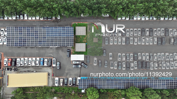 Charging stations are filling with charging vehicles in Shenyang, China, on July 8, 2024. It is understood that the charging station is sett...