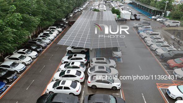 Charging stations are filling with charging vehicles in Shenyang, China, on July 8, 2024. It is understood that the charging station is sett...