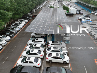 Charging stations are filling with charging vehicles in Shenyang, China, on July 8, 2024. It is understood that the charging station is sett...