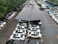 Charging stations are filling with charging vehicles in Shenyang, China, on July 8, 2024. It is understood that the charging station is sett...