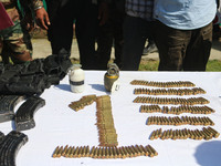 Arms and ammunition are being recovered from militants in twin encounters and are being displayed at an army base in Anantnag, south of Srin...